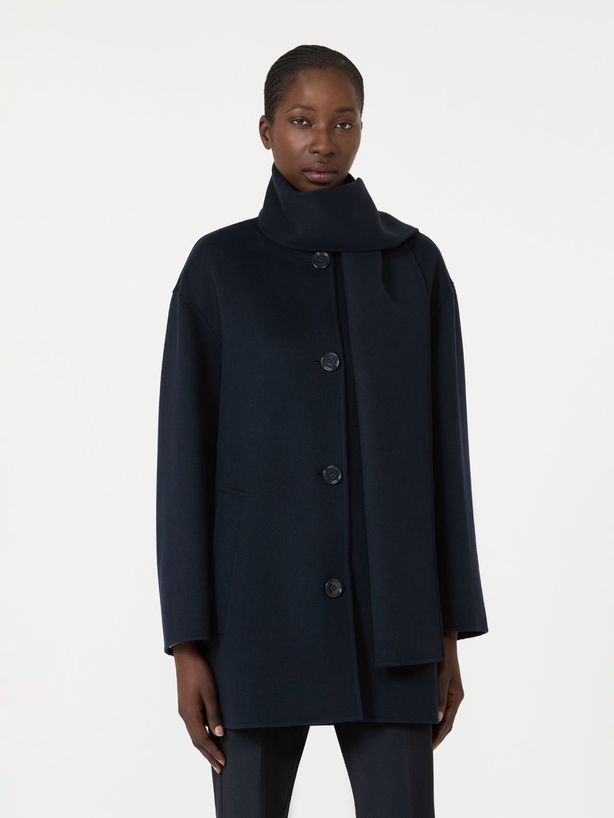 The scarf over a buttoned front