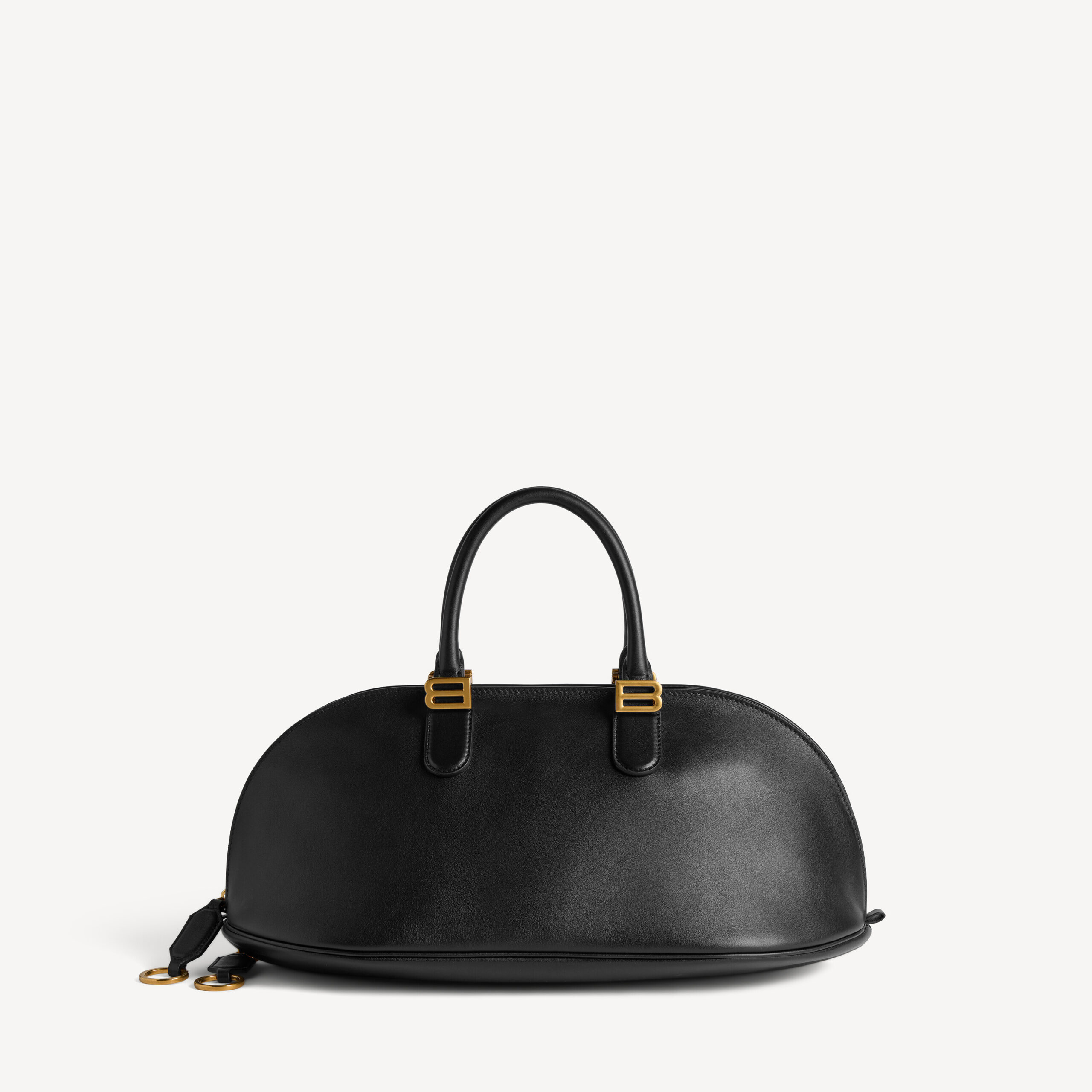 Front view of the black Balenciaga Bolero Bowling Bag Medium, $3,950