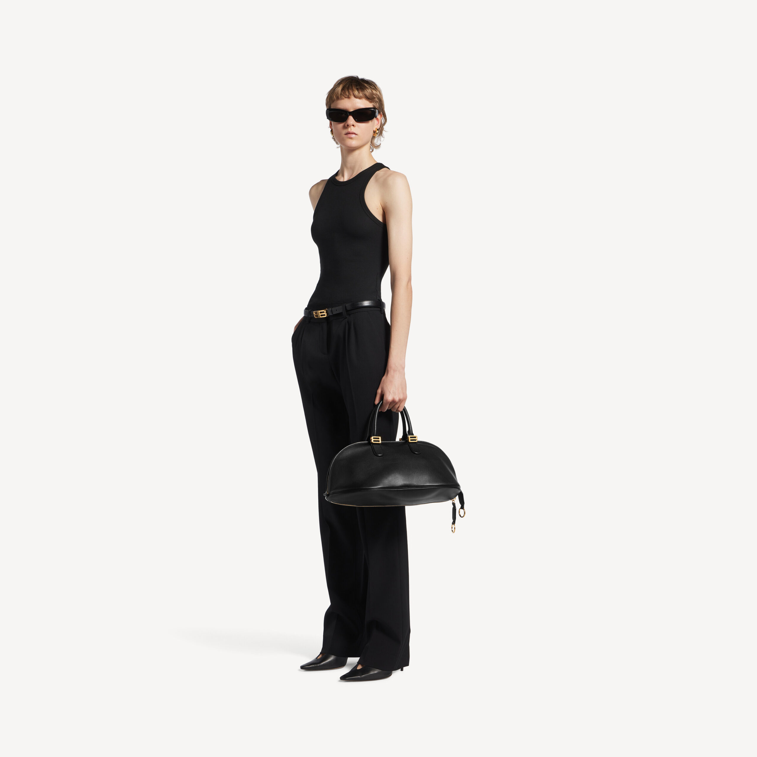 Official model carrying the Bolero Medium by hand, $3,950