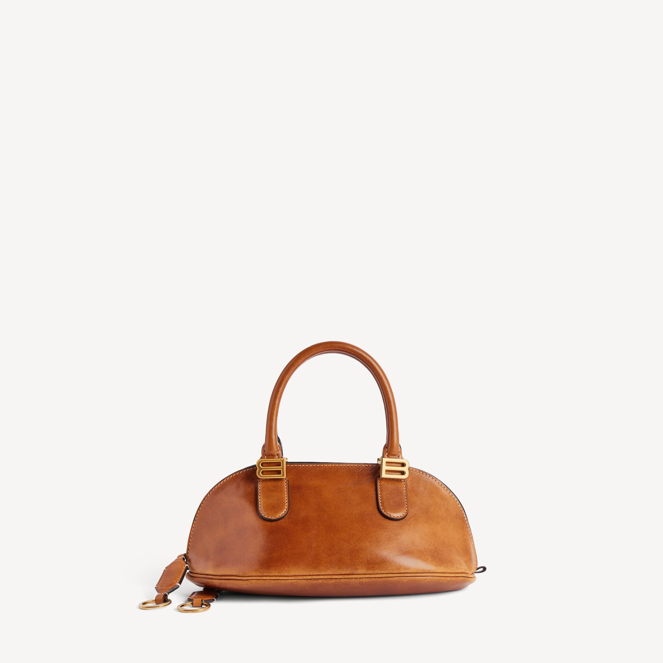 Mini Tan Cowboy, vegetal-tanned lambskin, $3,350, 8685852ACPB2823 (comparison size)